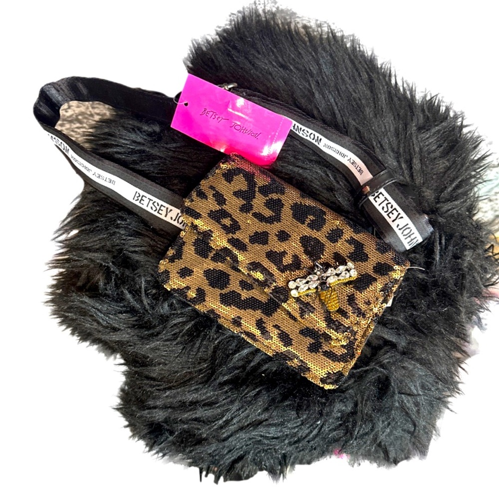Cheetah print Betsey Johnson pouch with a strap